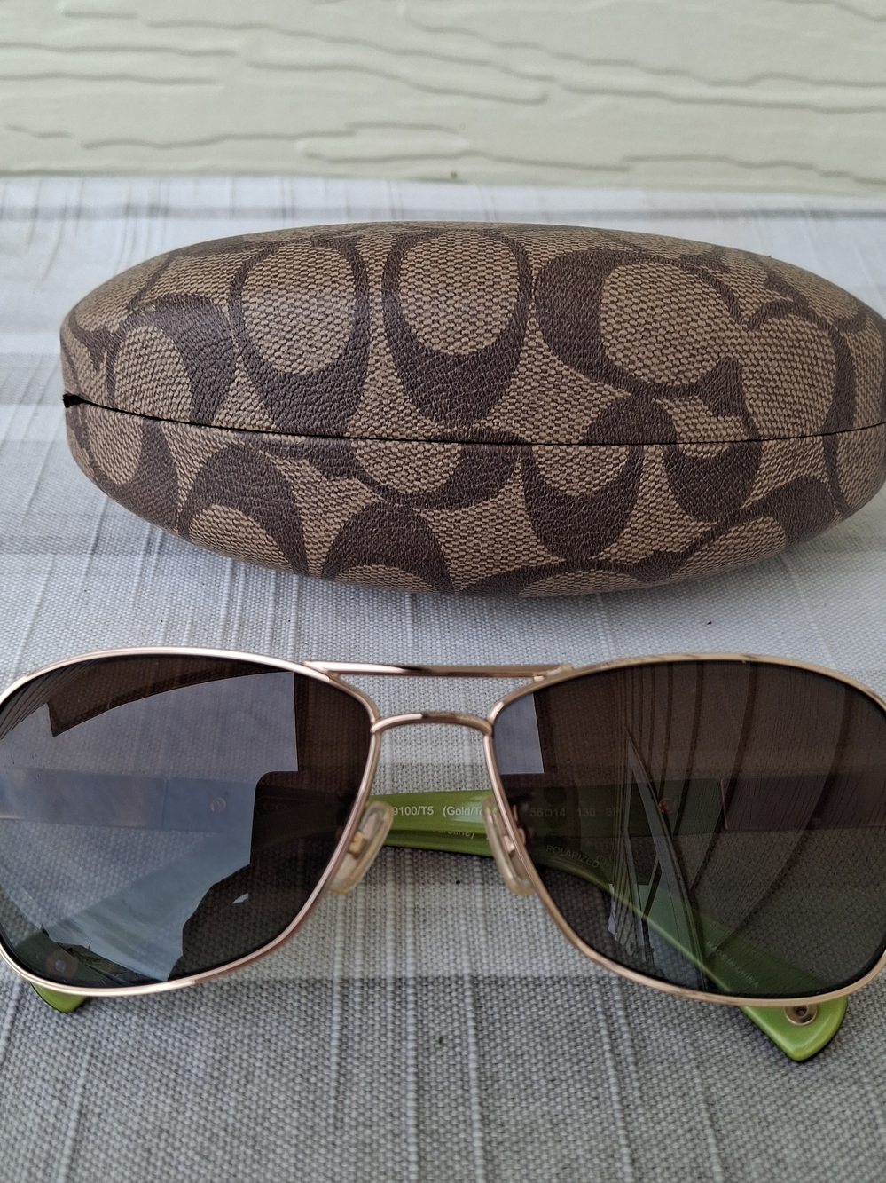 Coach HC 7012 Brown Signature Sunglasses with Brown Lenses